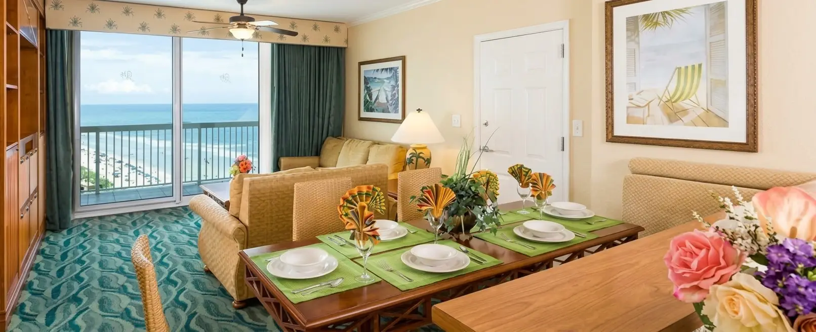 Oceanview suite living room with a set dining table and balcony at Westgate Myrtle Beach, with a Book Now & Choose Dates Later banner