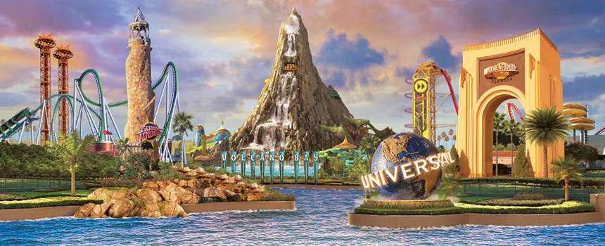 Universal globe with the Islands of Adventure lighthouse, Volcano Bay volcano and Universal Studios gate