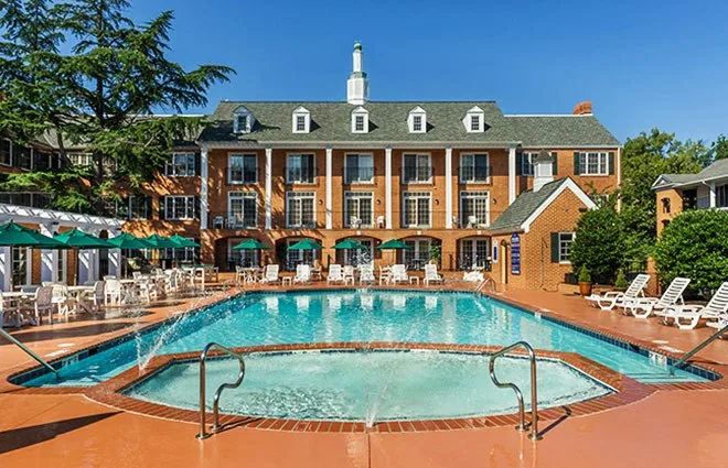 Colonial-style buildings around the pool at Westgate Historic Williamsburg Resort